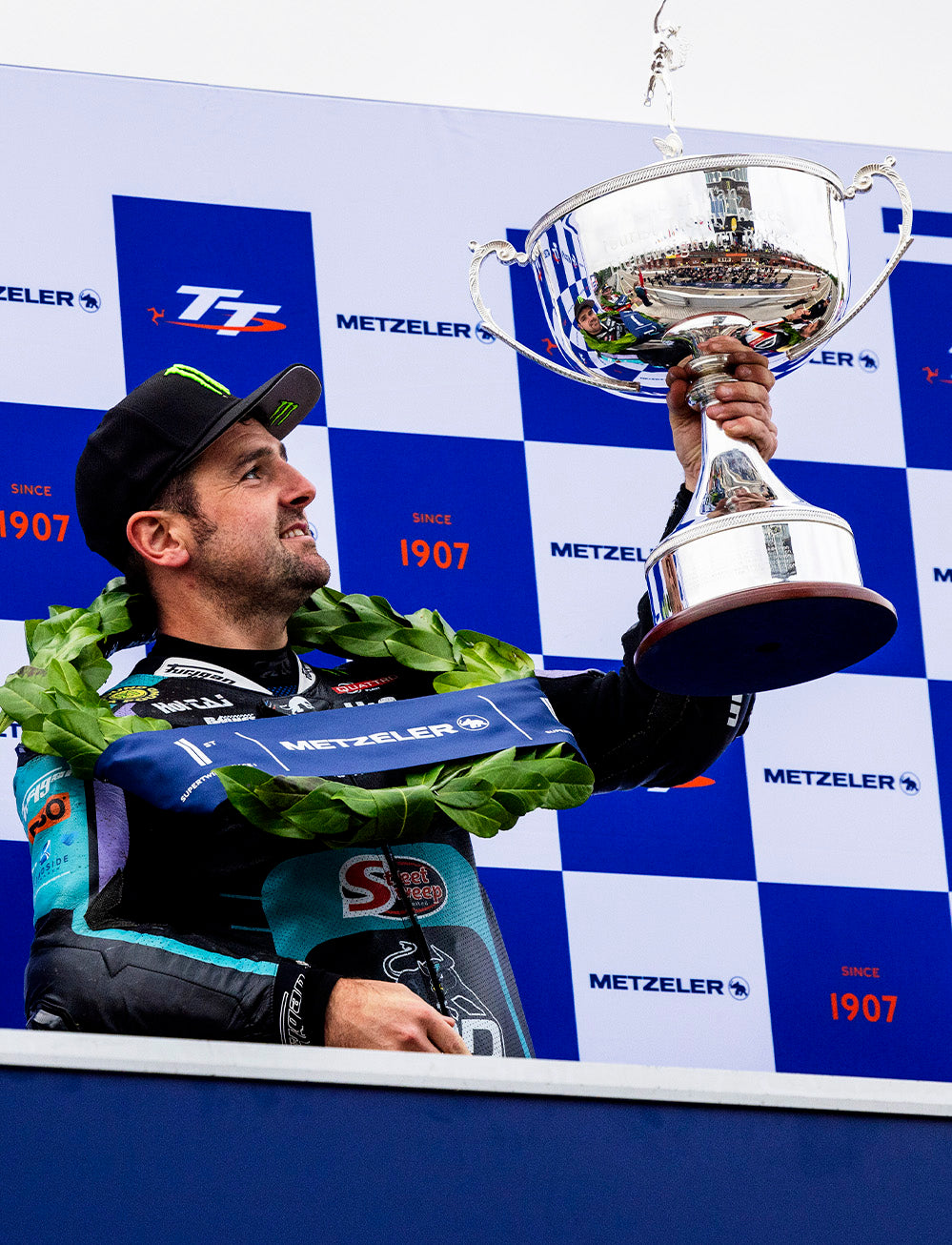 Isle of Man TT Races 2025 Metzeler Supertwin TT Race 1 Podium Backdrop